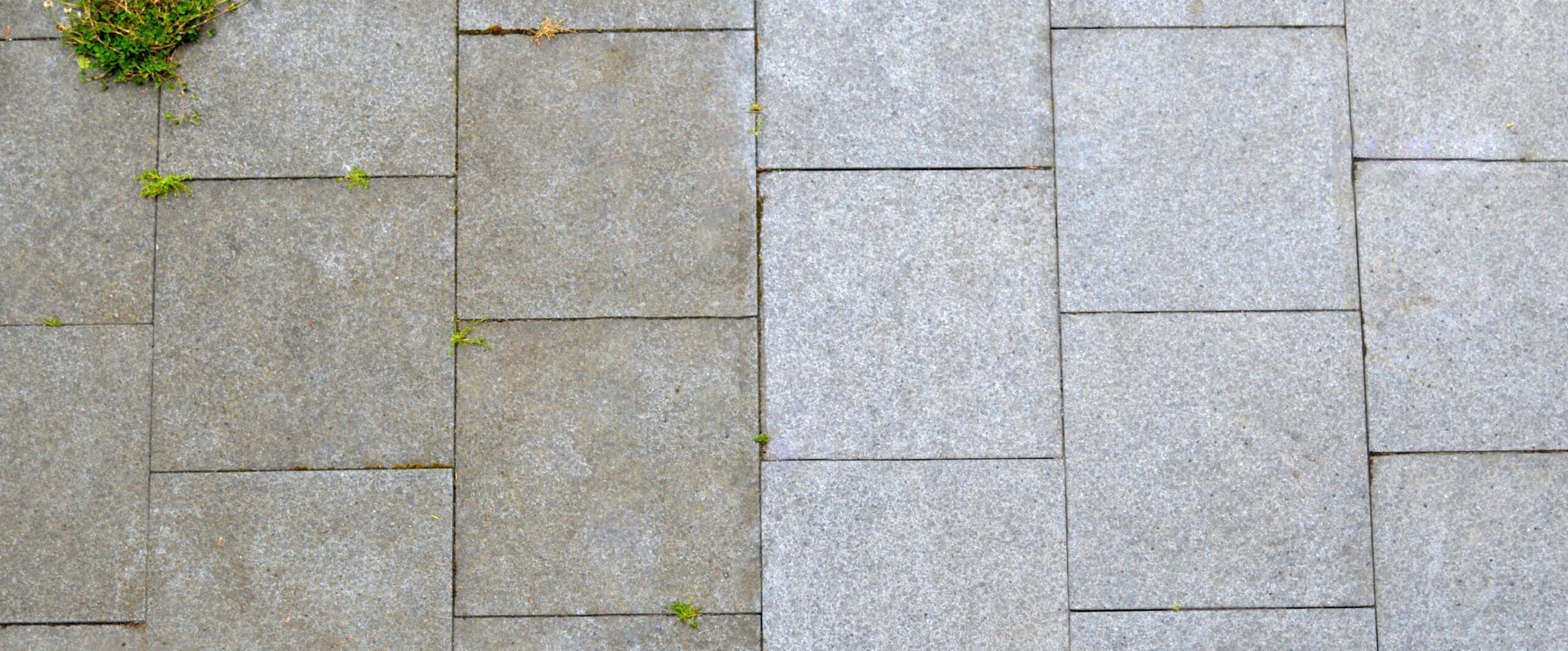 Black granite tiles, before and after cleaning with high pressure water